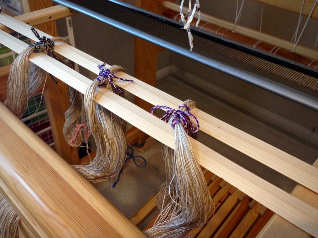 Ready to pre-sley the reed with linen.