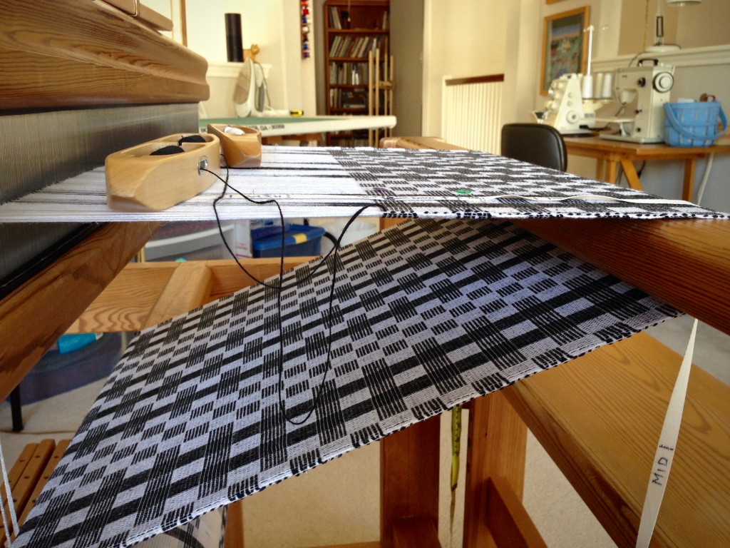 Finishing up black and white cottolin table runner.