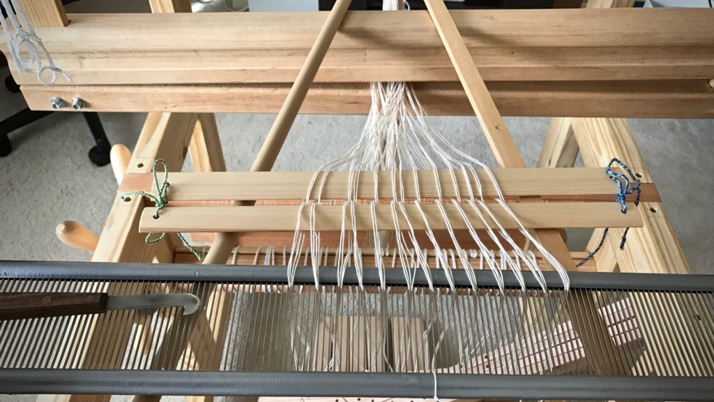 Maiden warp for a new sweet little loom.