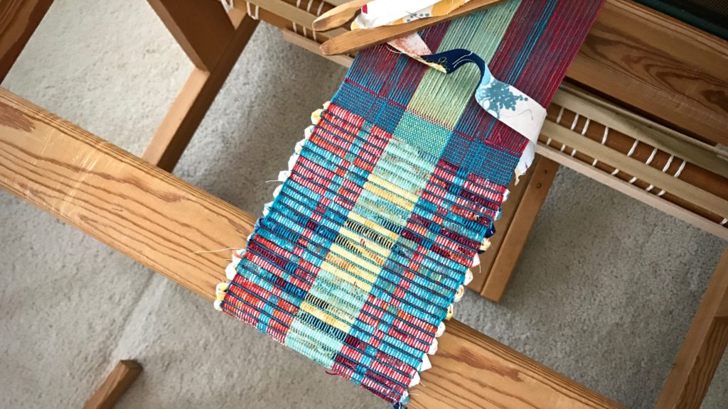 Making rep weave mug rugs.