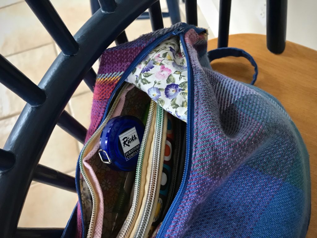 No purse is complete without a tape measure, right?