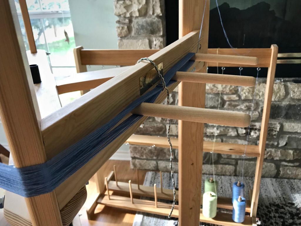 Winding a warp with pretty Willow and Cornflower 8/2 cotton.